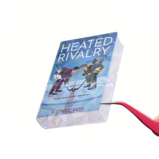 Currently Reading Heated Rivalry Die Cut Sticker